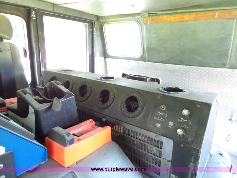 image for item L7087 1996 Sutphen Crew Cab ladder fire truck