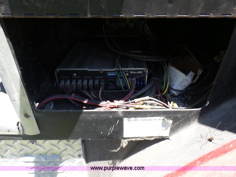 image for item L7087 1996 Sutphen Crew Cab ladder fire truck