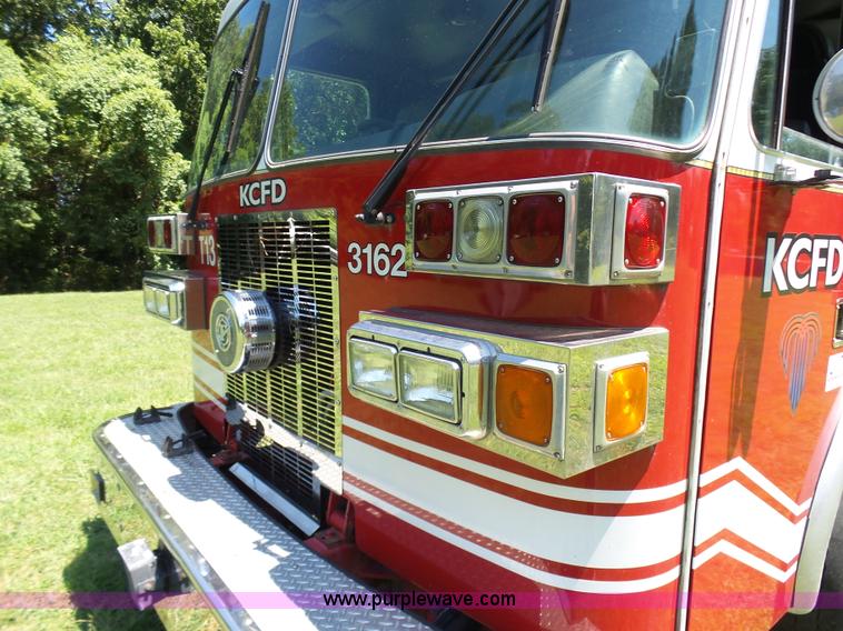 image for item L7087 1996 Sutphen Crew Cab ladder fire truck