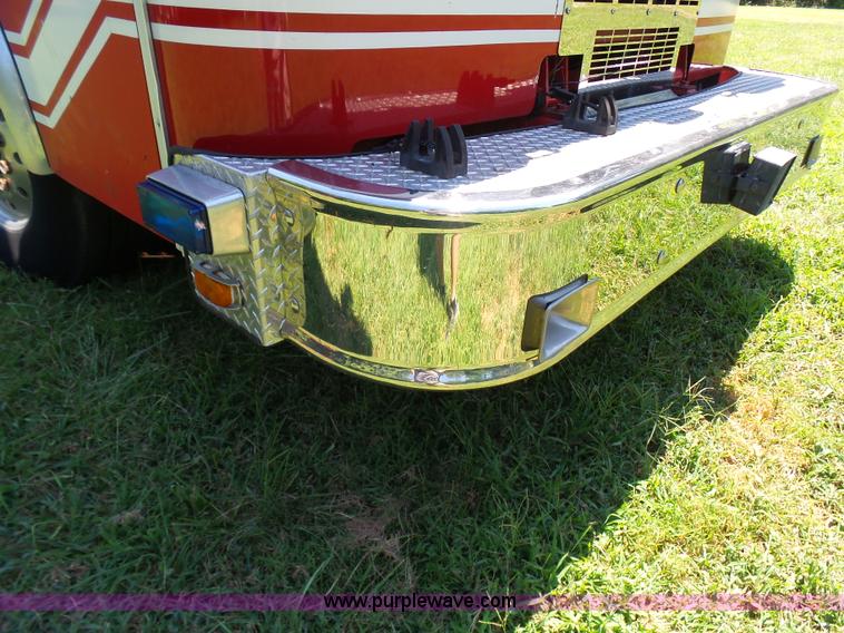 image for item L7087 1996 Sutphen Crew Cab ladder fire truck