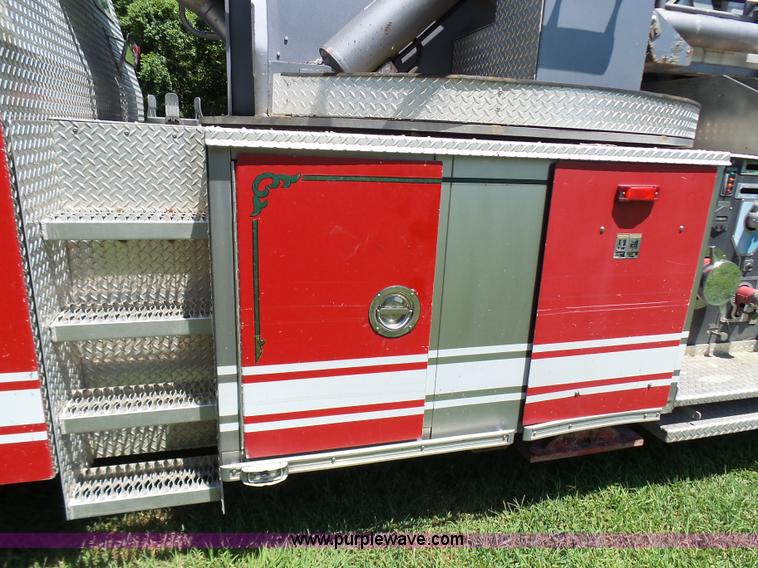 image for item L7087 1996 Sutphen Crew Cab ladder fire truck