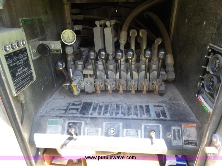 image for item L7087 1996 Sutphen Crew Cab ladder fire truck