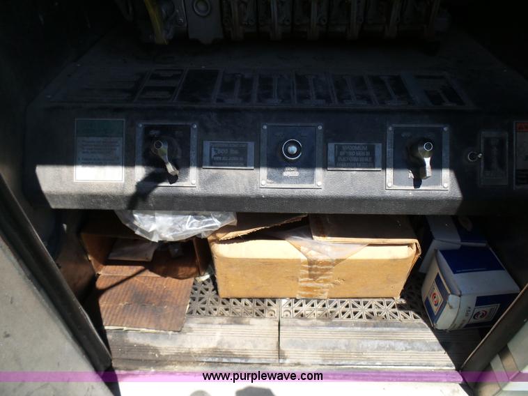 image for item L7087 1996 Sutphen Crew Cab ladder fire truck