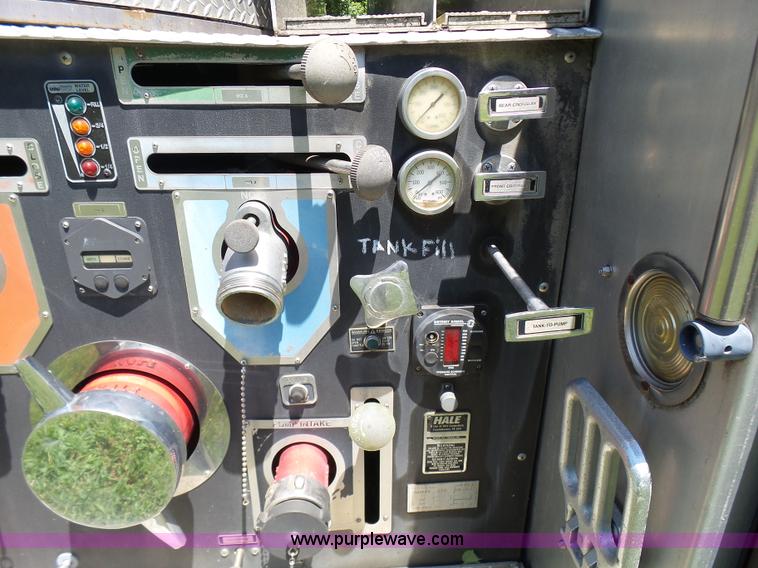 image for item L7087 1996 Sutphen Crew Cab ladder fire truck