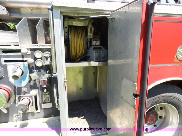 image for item L7087 1996 Sutphen Crew Cab ladder fire truck