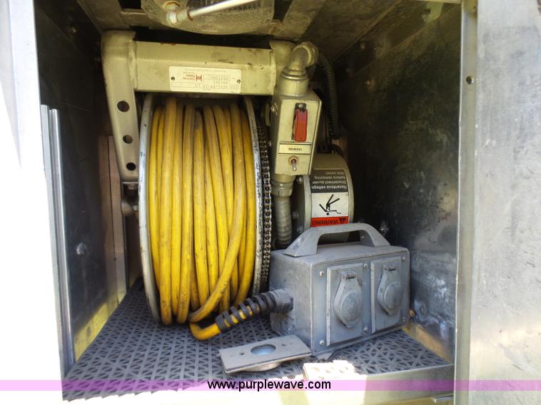 image for item L7087 1996 Sutphen Crew Cab ladder fire truck