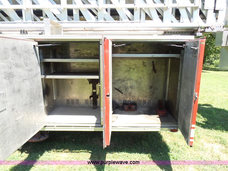 image for item L7087 1996 Sutphen Crew Cab ladder fire truck