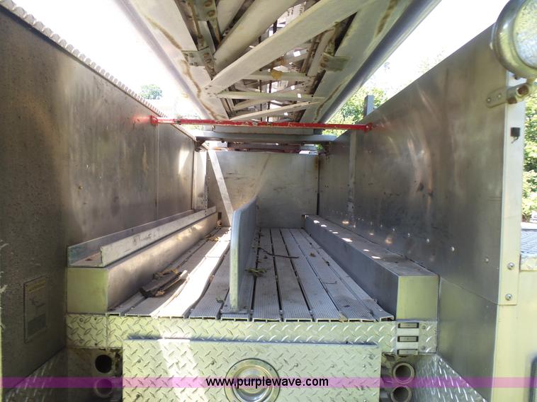 image for item L7087 1996 Sutphen Crew Cab ladder fire truck