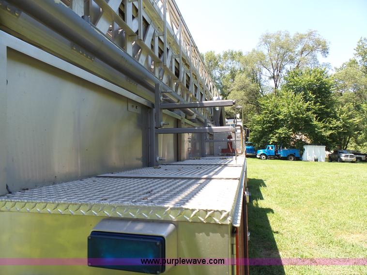 image for item L7087 1996 Sutphen Crew Cab ladder fire truck