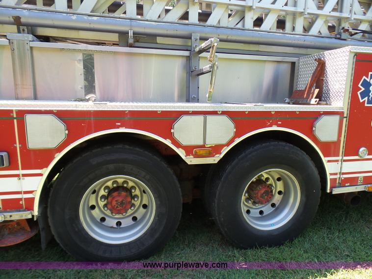 image for item L7087 1996 Sutphen Crew Cab ladder fire truck