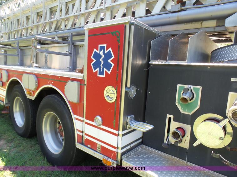 image for item L7087 1996 Sutphen Crew Cab ladder fire truck