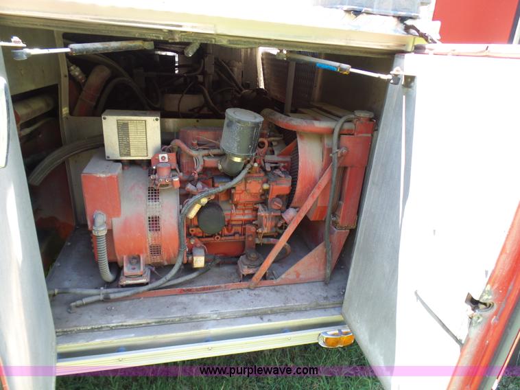 image for item L7087 1996 Sutphen Crew Cab ladder fire truck