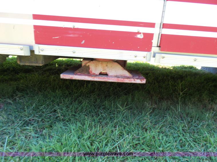 image for item L7087 1996 Sutphen Crew Cab ladder fire truck