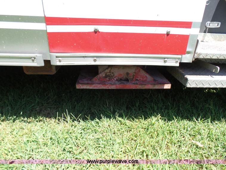 image for item L7087 1996 Sutphen Crew Cab ladder fire truck