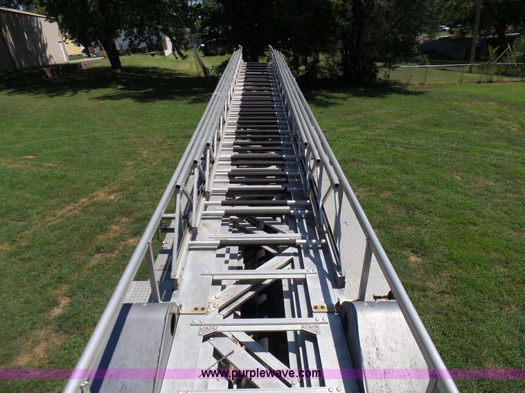 image for item L7087 1996 Sutphen Crew Cab ladder fire truck