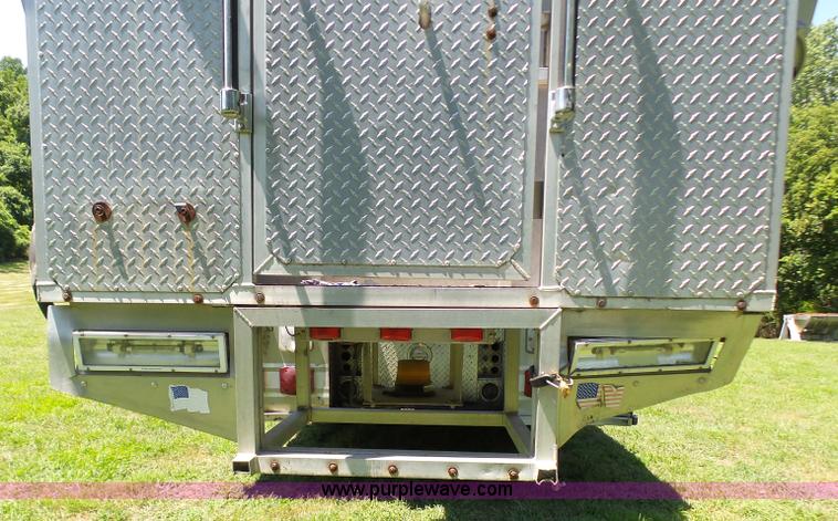 image for item L7087 1996 Sutphen Crew Cab ladder fire truck