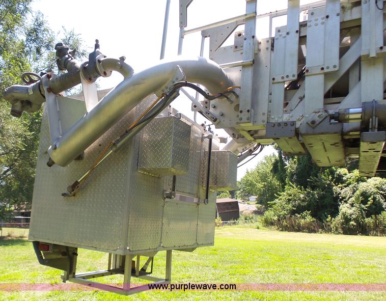 image for item L7087 1996 Sutphen Crew Cab ladder fire truck