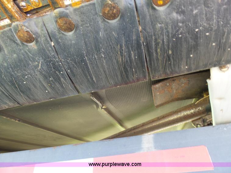 image for item K3112 2009 MacDon FD70 flex draper head