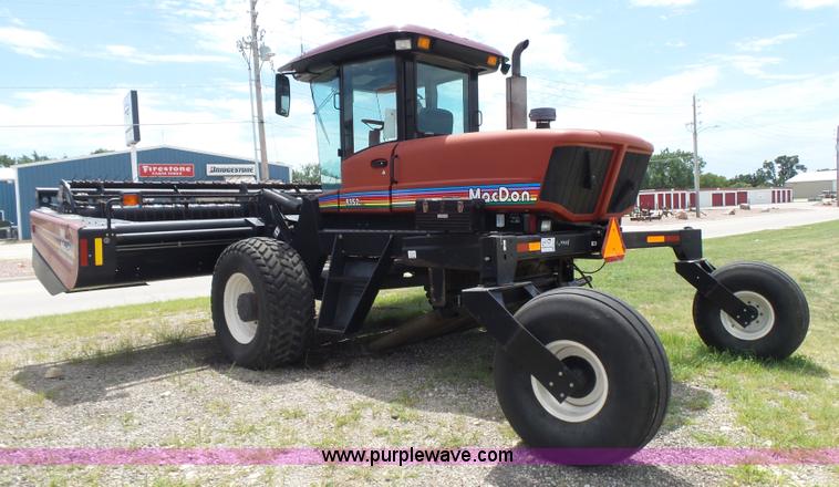 image for item K3113 2003 MacDon 9352 self-propelled windrower