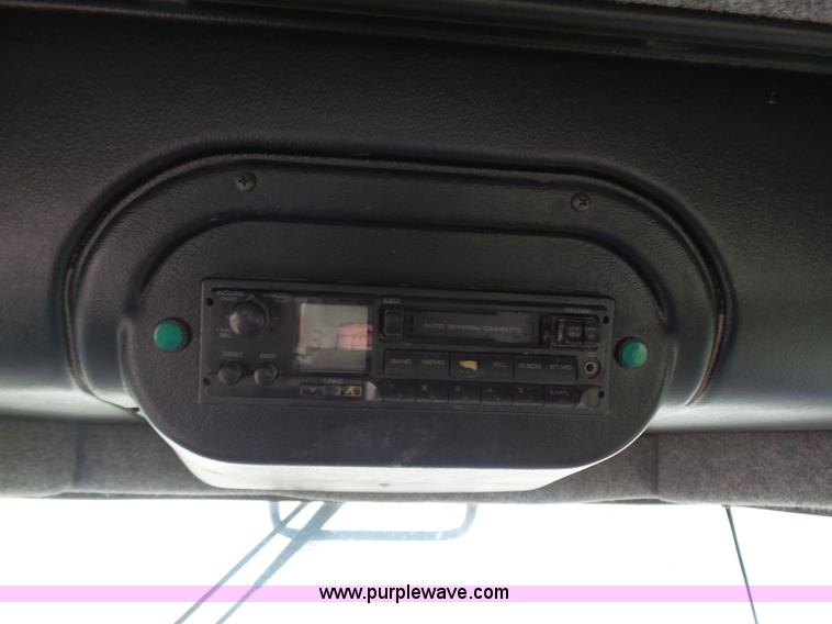 image for item K3113 2003 MacDon 9352 self-propelled windrower