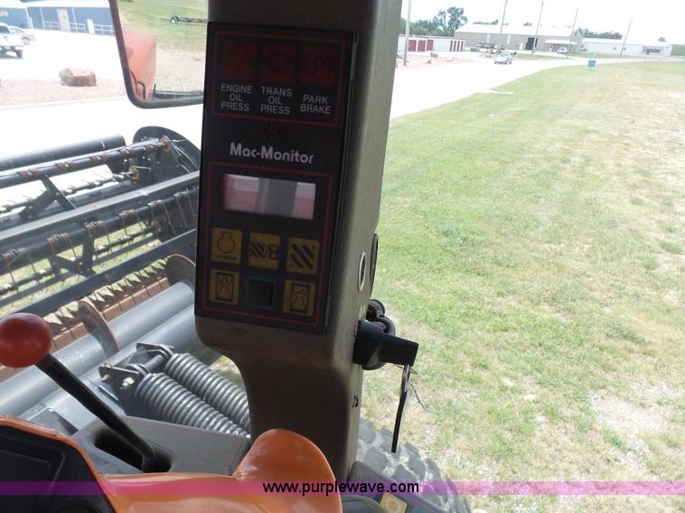 image for item K3113 2003 MacDon 9352 self-propelled windrower
