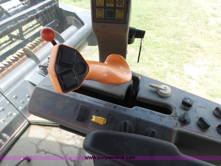 image for item K3113 2003 MacDon 9352 self-propelled windrower