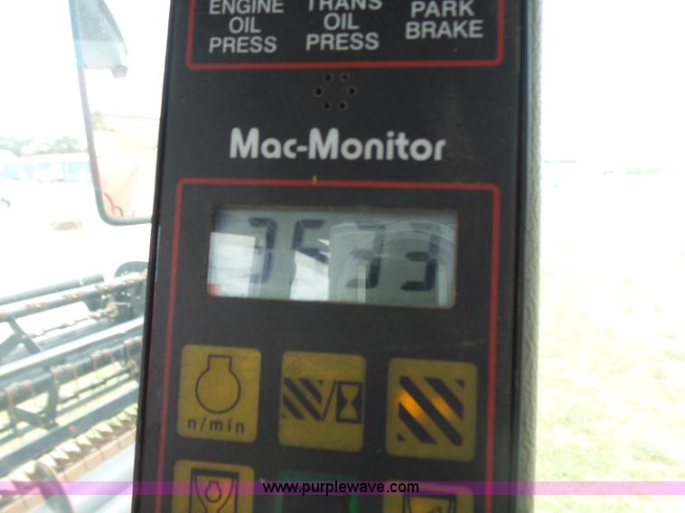 image for item K3113 2003 MacDon 9352 self-propelled windrower