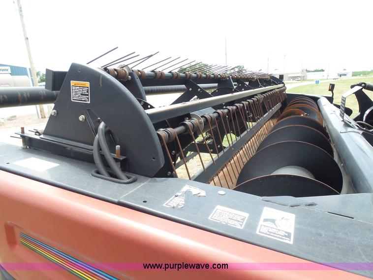 image for item K3113 2003 MacDon 9352 self-propelled windrower