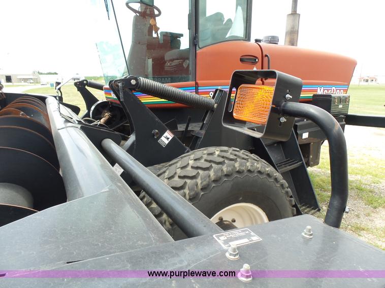 image for item K3113 2003 MacDon 9352 self-propelled windrower
