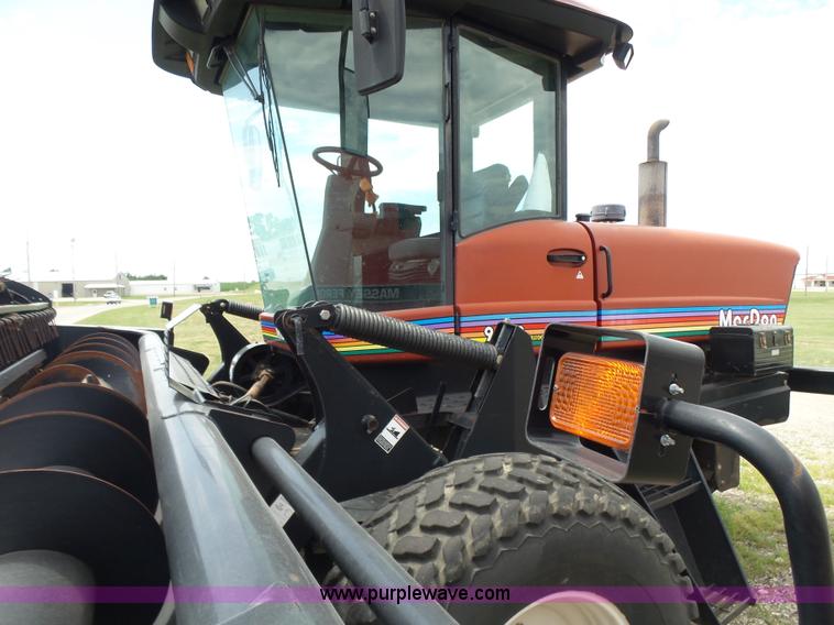 image for item K3113 2003 MacDon 9352 self-propelled windrower