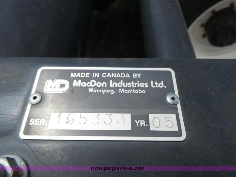 image for item K3113 2003 MacDon 9352 self-propelled windrower