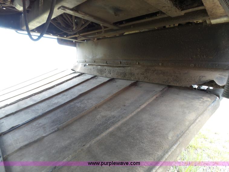 image for item K3113 2003 MacDon 9352 self-propelled windrower