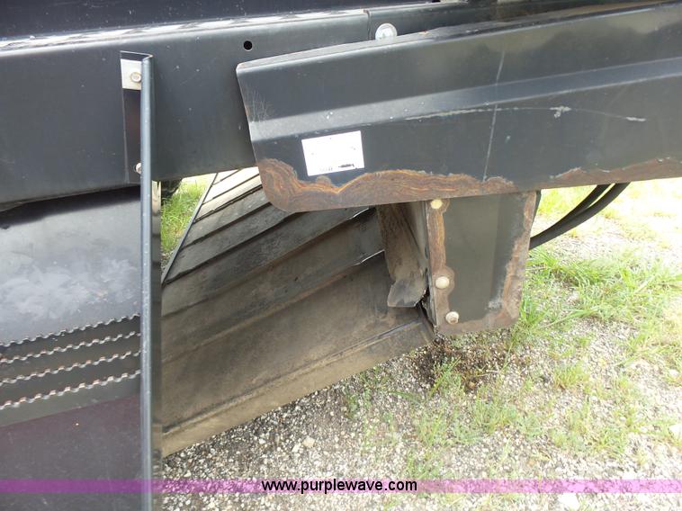 image for item K3113 2003 MacDon 9352 self-propelled windrower