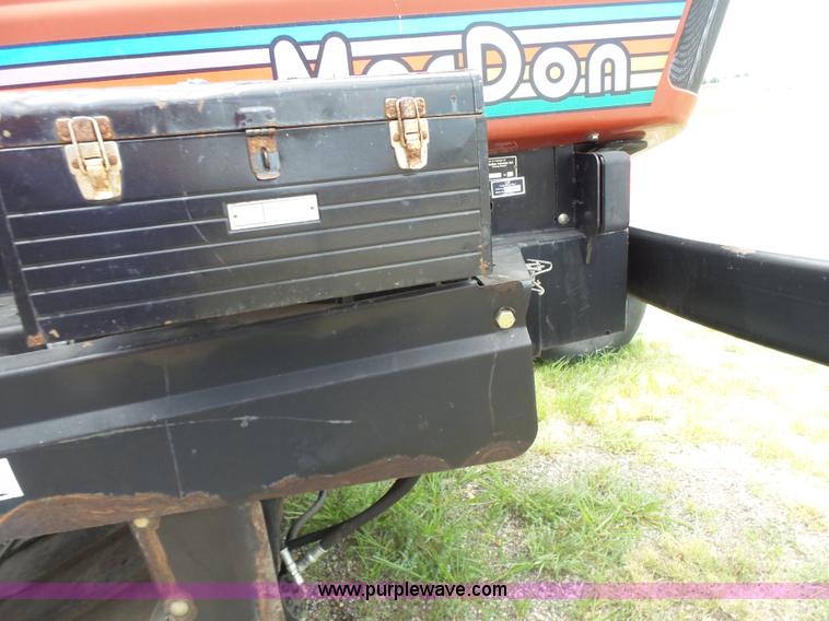 image for item K3113 2003 MacDon 9352 self-propelled windrower