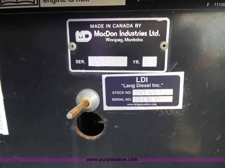 image for item K3113 2003 MacDon 9352 self-propelled windrower