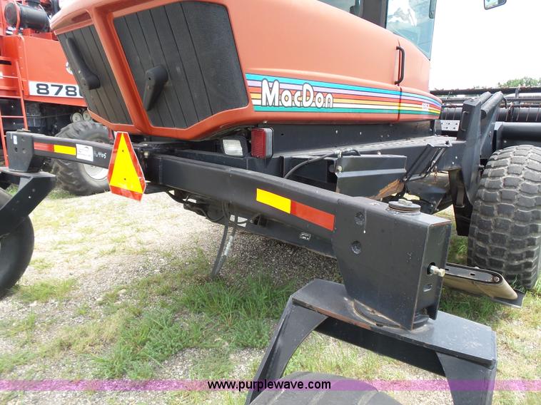 image for item K3113 2003 MacDon 9352 self-propelled windrower