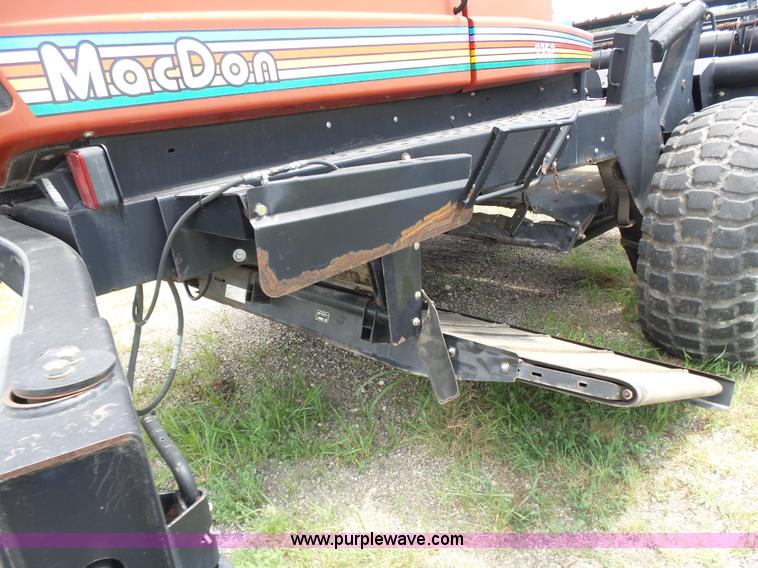 image for item K3113 2003 MacDon 9352 self-propelled windrower