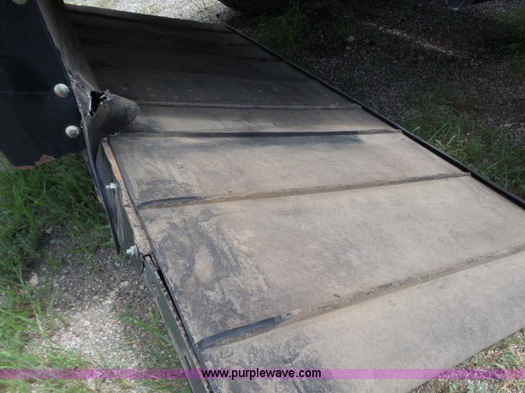 image for item K3113 2003 MacDon 9352 self-propelled windrower