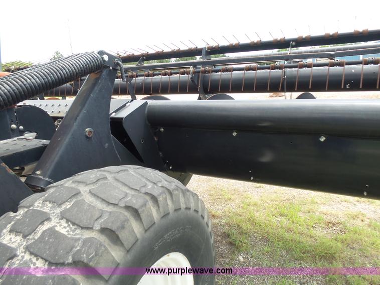 image for item K3113 2003 MacDon 9352 self-propelled windrower