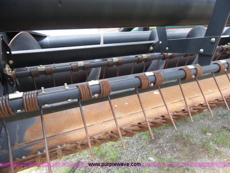 image for item K3113 2003 MacDon 9352 self-propelled windrower