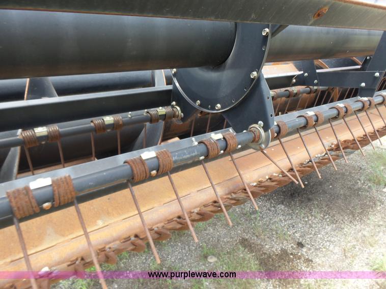 image for item K3113 2003 MacDon 9352 self-propelled windrower