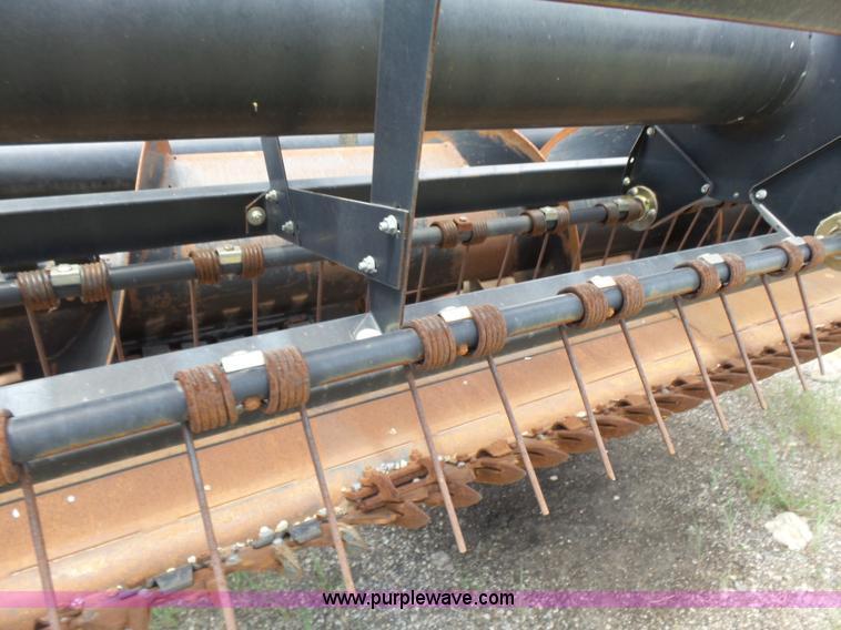 image for item K3113 2003 MacDon 9352 self-propelled windrower