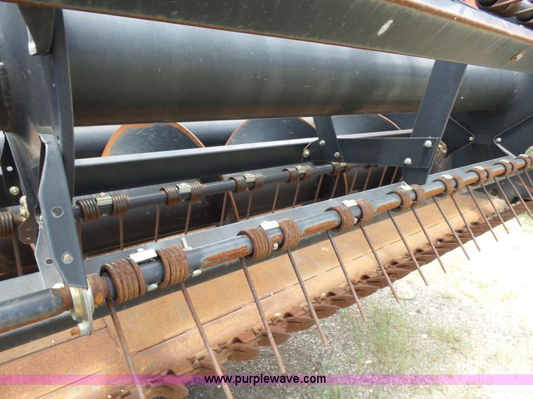 image for item K3113 2003 MacDon 9352 self-propelled windrower