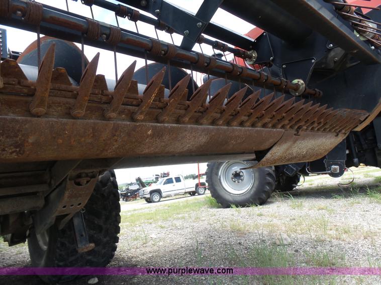 image for item K3113 2003 MacDon 9352 self-propelled windrower