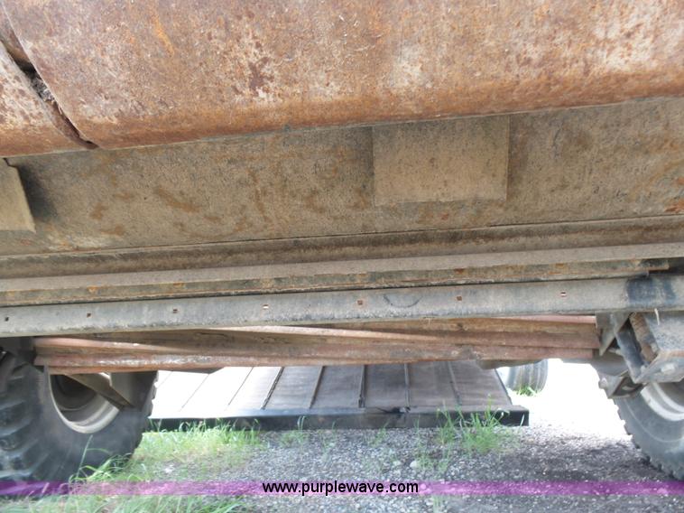 image for item K3113 2003 MacDon 9352 self-propelled windrower