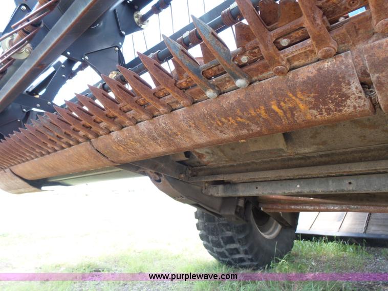 image for item K3113 2003 MacDon 9352 self-propelled windrower