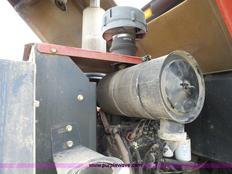 image for item K3113 2003 MacDon 9352 self-propelled windrower