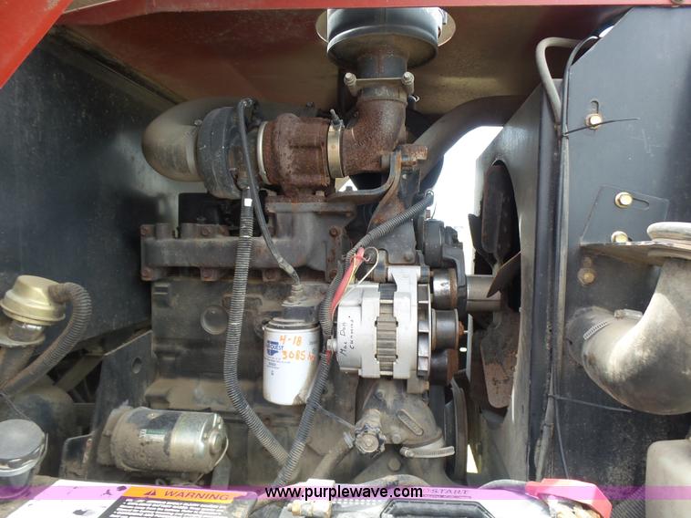 image for item K3113 2003 MacDon 9352 self-propelled windrower