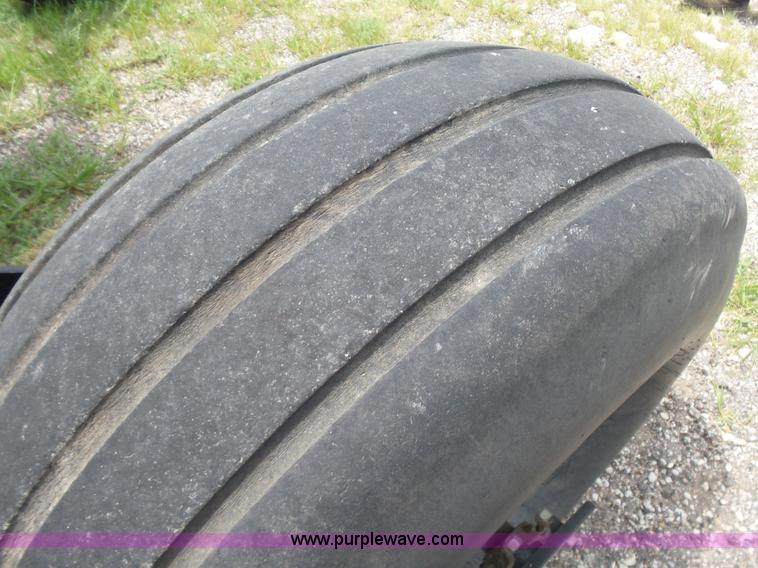 image for item K3113 2003 MacDon 9352 self-propelled windrower