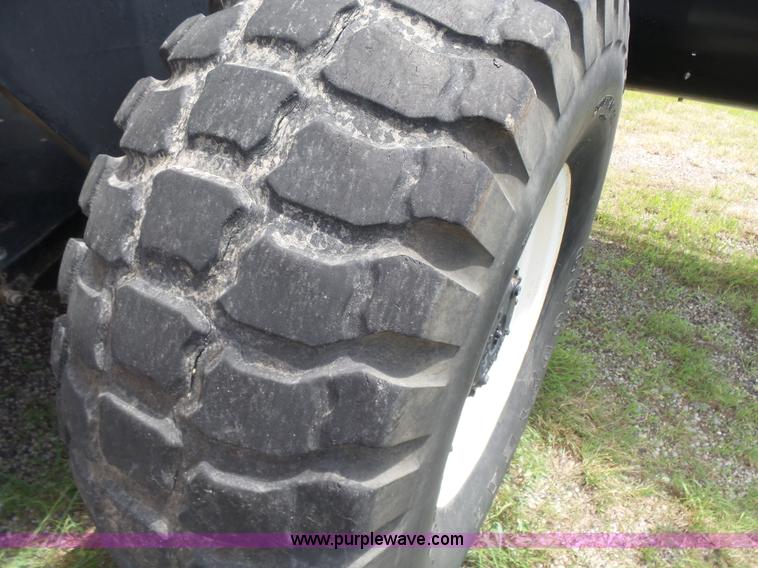 image for item K3113 2003 MacDon 9352 self-propelled windrower